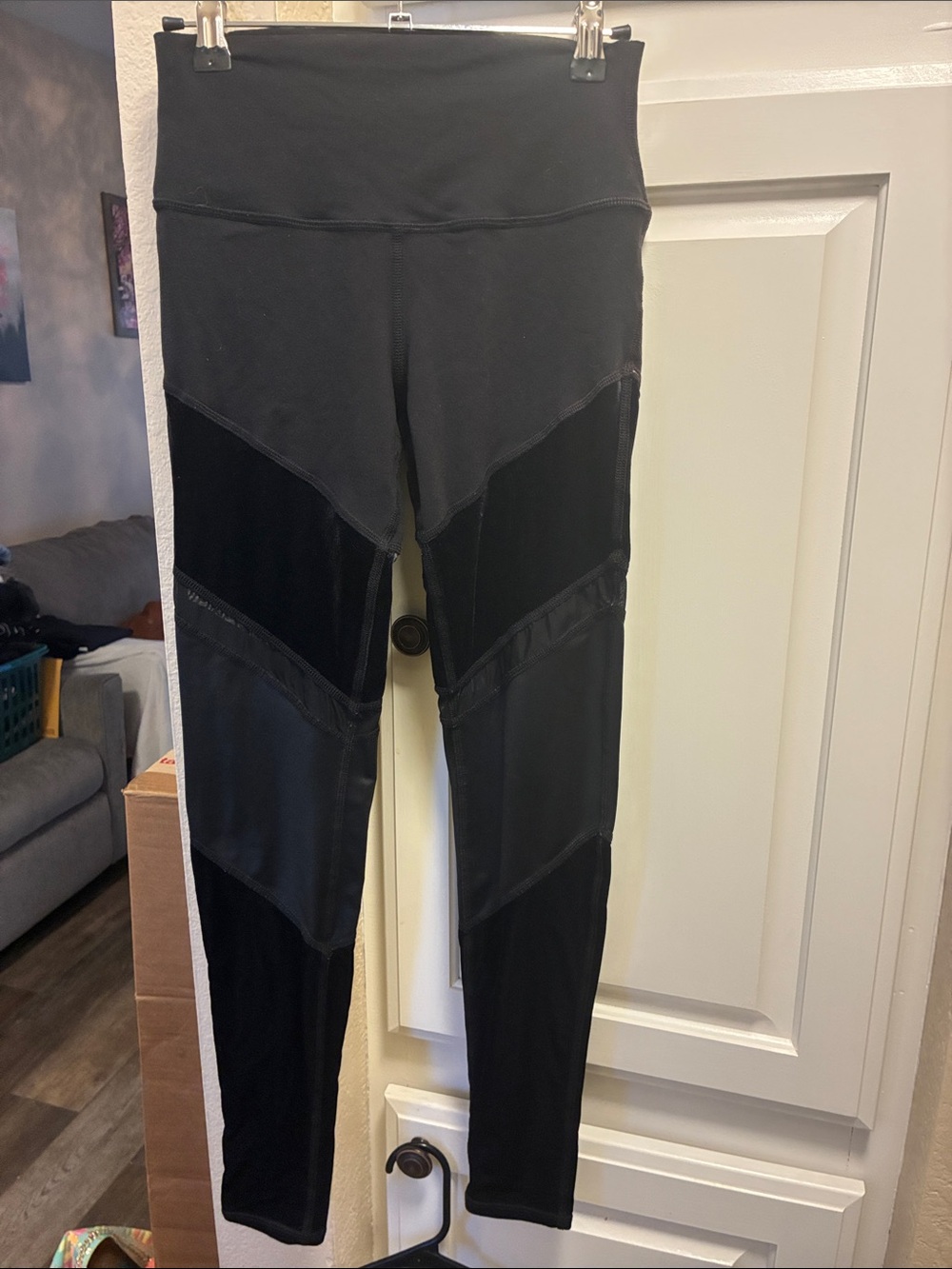 Alo Yoga black leggings with tonal mesh and velvet panels